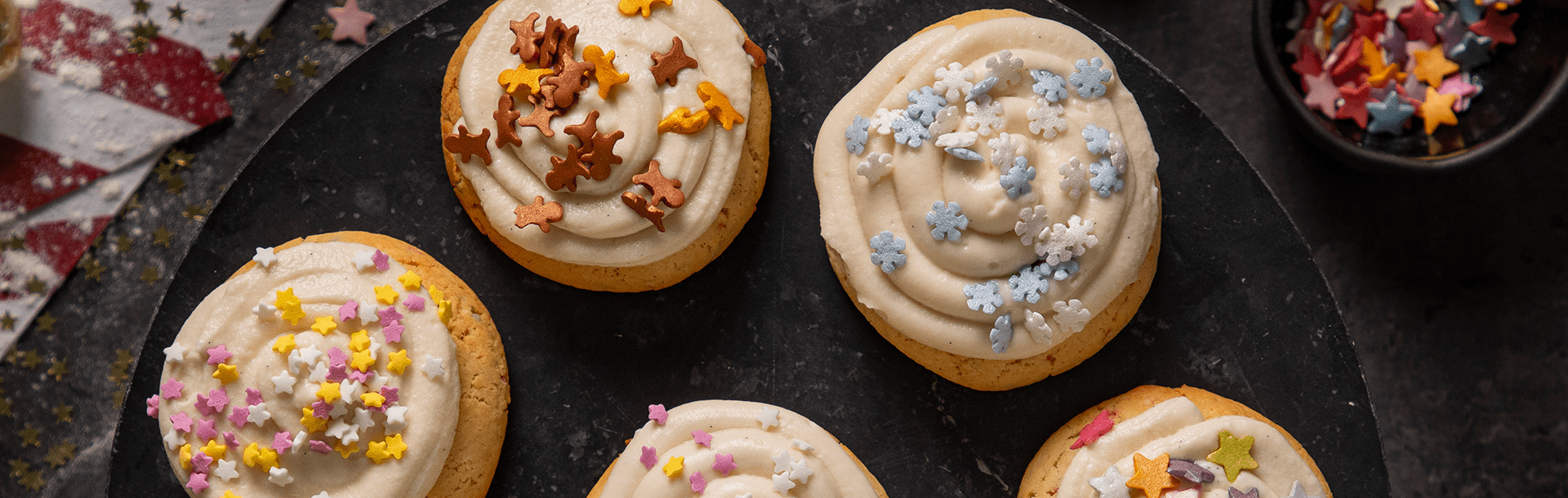 Christmas cookies with Violife dairy free cream cheese frosting and Christmas decoration
